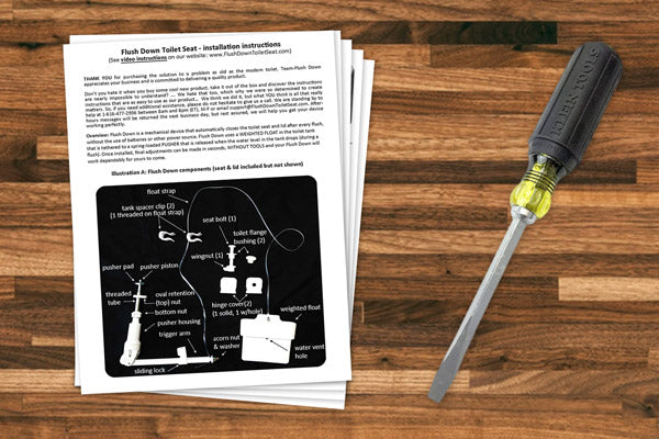 Picture of Flush Down installation manual next to a screwdriver